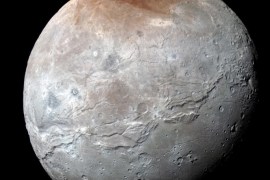 Pluto’s largest moon, Charon, is seen in a high-resolution, enhanced color view captured by NASA's New Horizons spacecraft on July 14, 2015 and released September 15, 2016. Scientists have learned that reddish material in the north (top) polar region is chemically processed methane that escaped from Pluto’s atmosphere onto Charon. NASA/JHUAPL/SwRI/Handout via Reuters THIS IMAGE HAS BEEN SUPPLIED BY A THIRD PARTY. IT IS DISTRIBUTED, EXACTLY AS RECEIVED BY REUTERS, AS