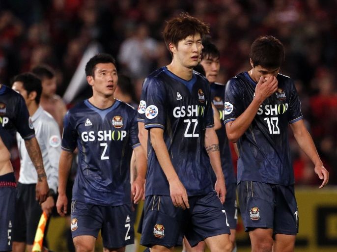 FC Seoul players react after losing their Asian Champions League soccer semi-final game against the Western Sydney Wanderers at Parramatta Stadium October 1, 2014. REUTERS/David Gray (AUSTRALIA - Tags: SPORT SOCCER)