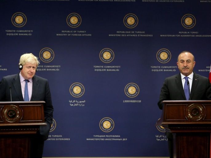British Foreign Secretary Boris Johnson (L) and Turkish Foreign Minister Mevlut Cavusoglu (R) speak to the media during a joint news conference following their meeting in Ankara, Turkey, 27 September 2016. Johnson is on a three-day visit to Turkey for talks with Turkish officials, including Turkish President Recep Tayyip Erdogan.