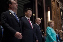 From left, French President Francois Hollande, Chinese President Xi Jinping, Russia's President Vladimir Putin and German Chancellor Angela Merkel arrive for the opening ceremony of the G20 Leaders Summit in Hangzhou, in China's eastern Zhejiang province on September 4, 2016. REUTERS/Nicolas Asfouri/Pool