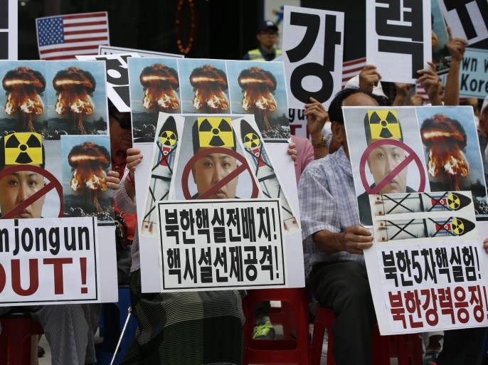 South Korean activists shout slogans as they hold up banners during a rally held to protest against North Korea's fifth Nuclear test, in Seoul, South Korea, 10 September 2016. North Korea confirmed its fifth nuclear test on 09 September.
