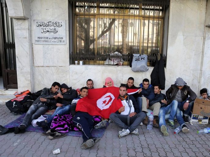 Unemployed Tunisians from city of Kasserine sit outside Tunisian Ministry of Vocational Training and Employment urging the government to provide them with job opportunities in Tunis, Tunisia, 15 February 2016. Protests erupted during January in the western central province of Kasserine against high unemployment, and soon spread to other areas including the capital, Tunis, forcing the government to impose a two-week night-time curfew.