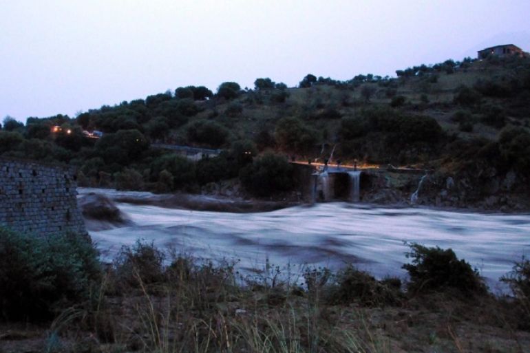 A general view showing a collapsed bridge following a heavy storm, near Oliena, Sardinia, Italy, 18 November 2013. Media reports state that at least one person was found dead in her flooded home after the heavy storm, which reportedly was called 'Cyclone Cleopatra', hit the Italian island of Sardinia earlier the same day.