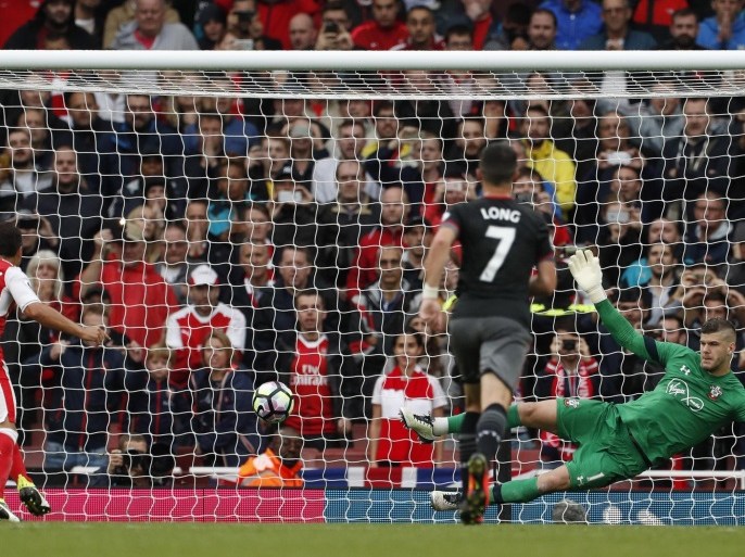 Britain Soccer Football - Arsenal v Southampton - Premier League - Emirates Stadium - 10/9/16 Arsenal's Santi Cazorla scores their second goal from the penalty spot Action Images via Reuters / John Sibley Livepic EDITORIAL USE ONLY. No use with unauthorized audio, video, data, fixture lists, club/league logos or "live" services. Online in-match use limited to 45 images, no video emulation. No use in betting, games or single club/league/player publications. Please contact your account representative for further details.
