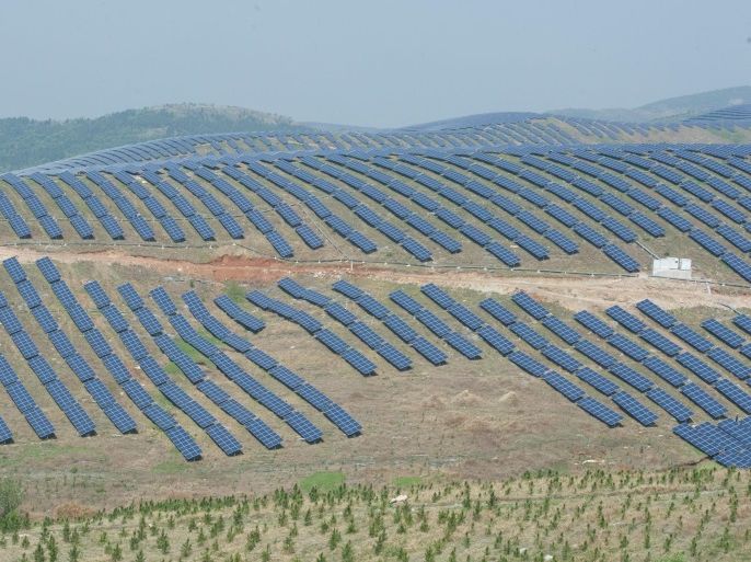 Solar panels are seen placed on hills in Chaohu, Anhui Province, China, April 18, 2016. China Daily/via REUTERS ATTENTION EDITORS - THIS IMAGE WAS PROVIDED BY A THIRD PARTY. EDITORIAL USE ONLY. CHINA OUT.NO COMMERCIAL OR EDITORIAL SALES IN CHINA