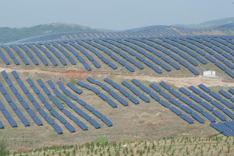 Solar panels are seen placed on hills in Chaohu, Anhui Province, China, April 18, 2016. China Daily/via REUTERS ATTENTION EDITORS - THIS IMAGE WAS PROVIDED BY A THIRD PARTY. EDITORIAL USE ONLY. CHINA OUT.NO COMMERCIAL OR EDITORIAL SALES IN CHINA