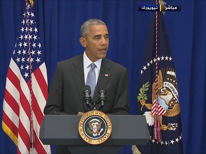 ‪‬ الرئيس الأميركي باراك أوباما أثناء حديثه أمس للصحافة(الجزيرة)
