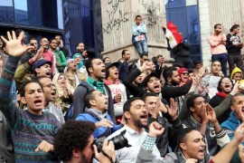 Anti-Government protesters shout slogans during a demonstration outside the Egyptian Journalist Syndicate in downtown Cairo, Egypt, 25 January 2015. According to local reports official celebrations of the 2011 protests which led to the fall of the Mubarak regime were cancelled due to the death of Saudi King Abdullah, however, security across Cairo has been increased ahead of 25th January, in the lead up to which their have been renewed protests both by Morsi supporters