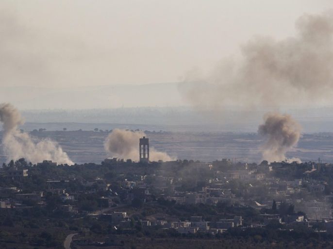An image taken from the Israeli side of the border with Syria on 11 September 2016, shows smoke rising from the village of Jubata, controlled by Islamic rebels, north of Quneitra, Syria, during the third day of fighting between the Syrian army loyal to the Syrian President Bashar Al Assad and Islamic rebels continue to clash over the border territory.