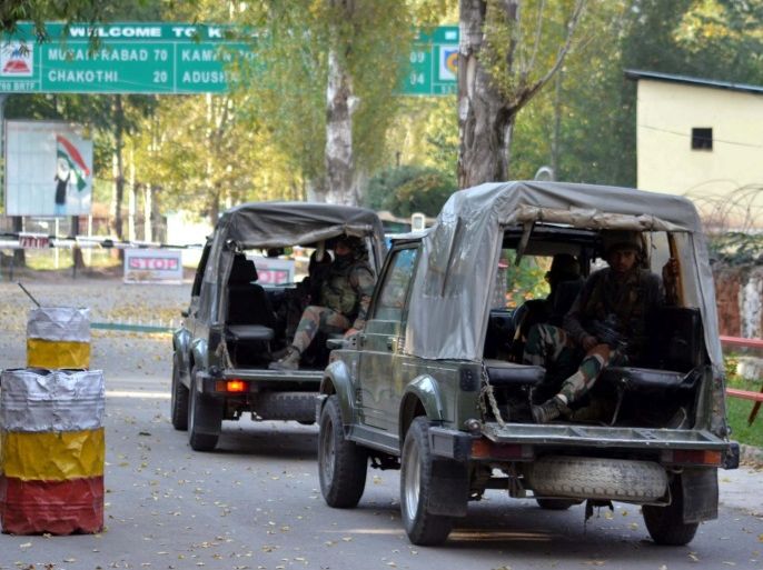 Indian soldiers enter the army base which was attacked by suspected militants in Uri, some 115 west of Srinagar, the summer capital of Indian Kashmir, 18 September 2016. At least 17 Indian Army soldiers and four militants were killed after a suicide attack on the base camp of the Indian Army at Uri, close to the Line of Control, which divides Kashmir between India and Pakistan. The attack is the deadliest attack on Indian Army in Kashmir in two decades and the incident