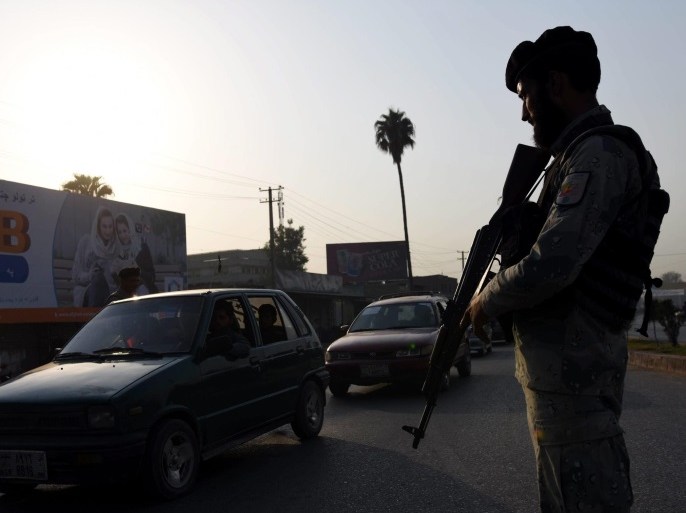 A member of the Afghan security services stands guard at a checkpoint on a roadside ahead of the Muslim festival of Eid al-Adha, in Jalalabad, Afghanistan, 09 September 2016. Muslims around the world prepare to celebrate Eid al-Adha, which falls on 12 September in Afghanistan. Eid al-Adha is the holiest of the two Muslims holidays celebrated each year, it marks the yearly Muslim pilgrimage (Hajj) to visit Mecca, the holiest place in Islam. Muslims slaughter a sacrificia