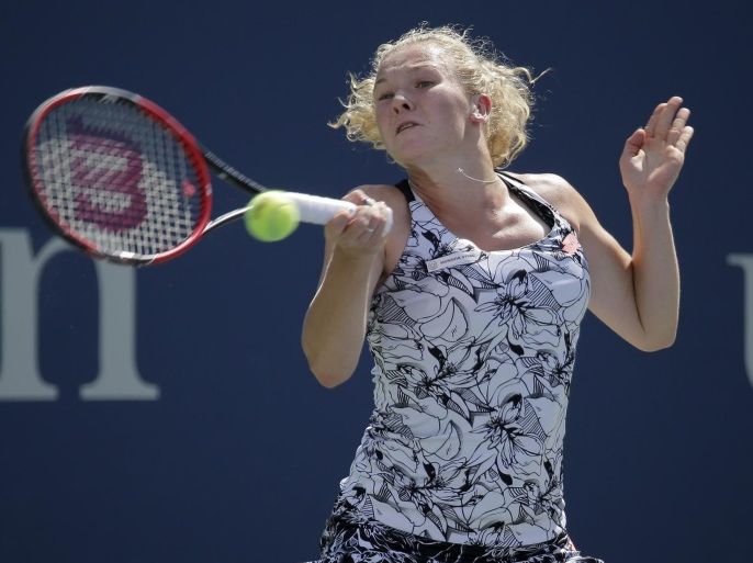 Katerina Siniakova of the Czech Republic hits a return to Eugenie Bouchard of Canada on the second day of the US Open Tennis Championships at the USTA National Tennis Center in Flushing Meadows, New York, USA, 30 August 2016. The US Open runs through September 11.