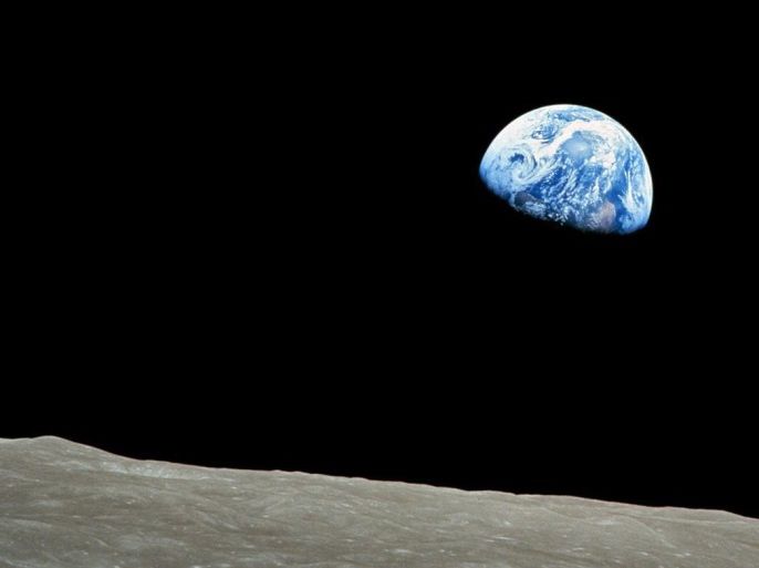 A handout picture released by NASA on 25 December 2013 shows a view of planet Earth seen from the Moon, at space, 24 December 1968. The Apollo Eight crew flew from Earth to the Moon and back again. Frank Borman, James Lovell, and William Anders were launched atop a Saturn V rocket on 21 December 1968, circled the Moon ten times in their command module, and returned to Earth on 27 December 1968. The Apollo Eight mission's impressive list of firsts includes: the first hu
