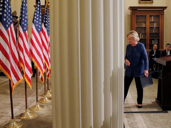 U.S. Democratic presidential candidate Hillary Clinton walks away after speaking to reporters after holding a "National Security Working Session" with national security advisors in New York, U.S. September 9, 2016. REUTERS/Brian Snyder