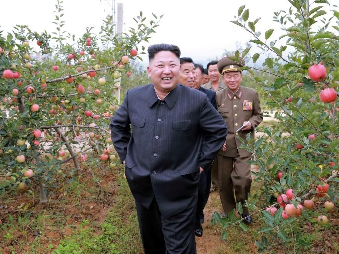 North Korean leader Kim Jong Un gives field guidance to the Kosan Combined Fruit Farm in this undated photo released by North Korea's Korean Central News Agency (KCNA) in Pyongyang September 18, 2016.KCNA via REUTERS ATTENTION EDITORS - THIS IMAGE WAS PROVIDED BY A THIRD PARTY. EDITORIAL USE ONLY. REUTERS IS UNABLE TO INDEPENDENTLY VERIFY THIS IMAGE. NO THIRD PARTY SALES. SOUTH KOREA OUT.