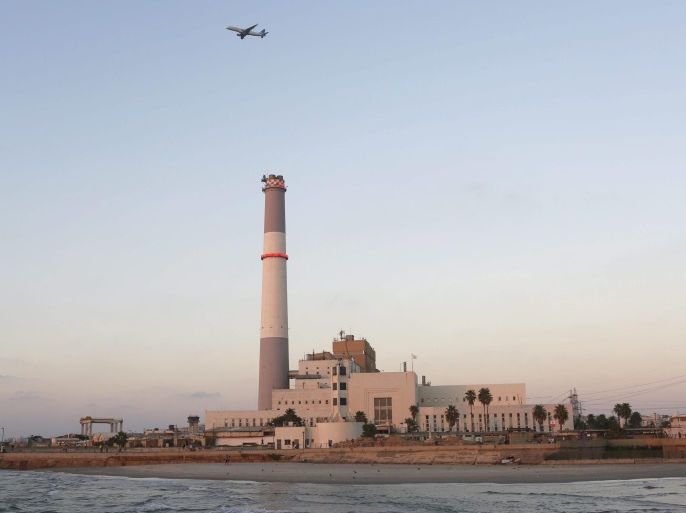 A plane seen above Tel Aviv's main electrical power plant 'Reading Power Station' in Tel Aviv Port, Israel, 10 September 2016. The Tel Aviv port was founded in 1936 and closed for ships in 1965. The port was renovated in 2011 and has become a major tourist, cultural and leisure complex site is today one of the most popular attractions in Tel Aviv with an estimated 4.3 million visitors annually.