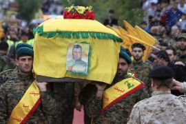 Lebanon's Hezbollah members carry the coffin of Ali Fayyad, one of Hezbollah's senior commanders who was killed fighting alongside Syrian army forces in Syria, during his funeral in Ansar village, southern Lebanon March 2, 2016. REUTERS/Ali Hashisho