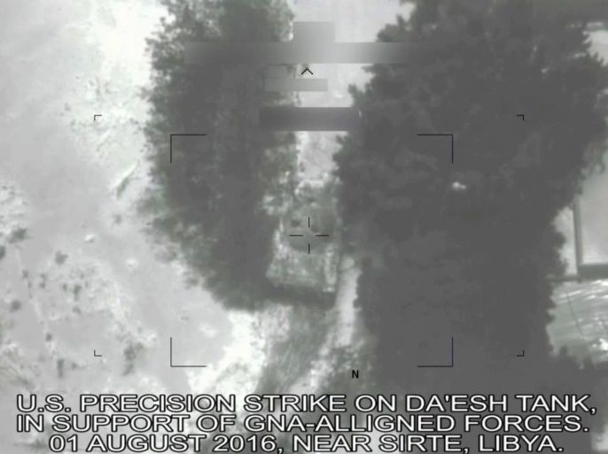 A framegrab taken from a handout video made available by the US Department of Defense (DoD) on 06 August 2016 shows the US military conducting precision air strikes, at the request of the Libyan Government of National Accord (GNA), against the so-called Islamic State (ISIS, ISIL or IS) targets in Sirte, Libya, 01 August 2016, to support GNA-affiliated forces seeking to defeat the jihadist militant group in its primary stronghold in the country. In frame is visible the first strike which successfully disabled a T-72 tank (C). EPA/USA DEPARTMENT OF DEFENSE -- BEST QUALITY AVAILABLE -- HANDOUT EDITORIAL USE ONLY