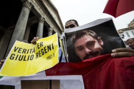 People carry signs reading 'Truth for Giulio Regeni' as they take part in a tochlight vigil to remember Giulio Regeni, an Italian student who was tortured and murdered in Cairo, Egypt, in front of the Pantheon, in the centre of Rome, Italy, 25 July 2016. Regeni's mutilated body was found on 03 February 2016.
