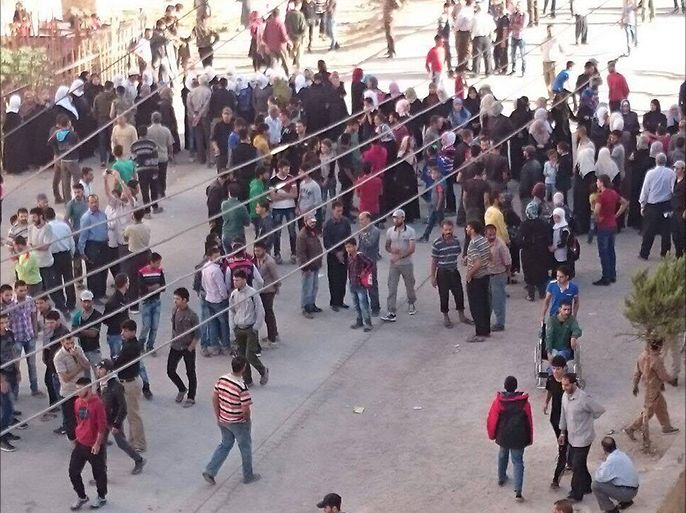 تجمع أهالي معضمية الشام استعدادا لرحلة التهجير المنتظرة