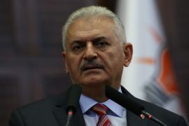 Turkey's Prime Minister Binali Yildirim addresses members of parliament from his ruling AK Party (AKP) during a meeting at the Turkish parliament in Ankara, Turkey, August 2, 2016. Hakan Goktepe/Prime Minister's Press Office/Handout via REUTERS ATTENTION EDITORS - THIS PICTURE WAS PROVIDED BY A THIRD PARTY. FOR EDITORIAL USE ONLY. NO RESALES. NO ARCHIVE.