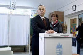 epa05566064 Hungarian Prime Minister Viktor Orban casts his vote in the company of his wife Aniko Levai during the referendum on the European Union's proposed mandatory migrant quota scheme at a polling station in Budapest, Hungary, 02 October 2016. The government-initiated referendum, which was officially approved by the National Assembly on 10th May, seeks a yes or no answer from voters to the following question: ’Do you want the European Union to be able to mandate the obligatory resettlement of non-Hungarian citizens into Hungary even without the approval of the National Assembly?’ EPA/SZILARD KOSZTICSAK HUNGARY OUT