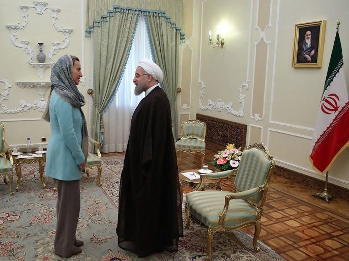 A handout picture made available by the Presidential office official website shows, Iranian President Hassan Rouhani (R) welcomes EU foreign policy chief Federica Mogherini at the presidential office in Tehran, Iran, 29 October 2016. Media Reported that Mogherini is in Tehran to discuss the lasts development in the region with Iranian officials. EPA/PRESIDENTIAL OFFICIAL WEBSITE / HANDOUT