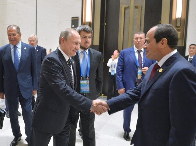 Russian President Vladimir Putin (C) shakes hands with Egyptian President Abdel Fattah el-Sisi (R) during a bilateral meeting at the sidelines of the G20 Summit in Hangzhou, China, 05 September 2016. The G20 Summit is held in Hangzhou on 04 to 05 September. EPA/ALEXEI DRUZHININ/SPUTNIK/KREMLIN POOL MANDATORY CREDIT