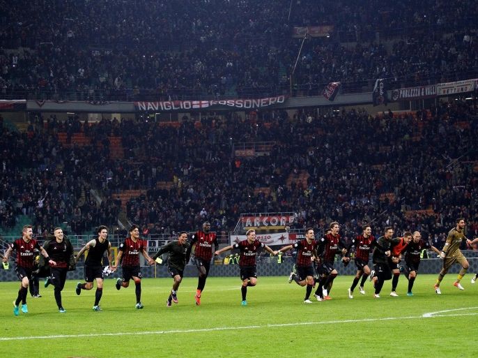 Football Soccer - AC Milan v Juventus - San Siro stadium, Milan Italy- 22/10/16 - AC Milan's players celebrate after winning the match. REUTERS/Alessandro Garofalo