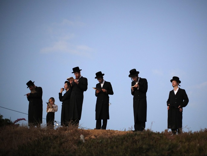 Ultra-orthodox Jews pray as they perform the Tashlich ritual at the beach in Herzliya, outside Tel Aviv, Israel, 10 October 2016. Tashlich is a ritual during which believers cast their sins into the water and the fish, and it is performed before the Day of Atonement or Yom Kippur. Yom Kippur, the most solemn day in the Jewish calendar, is a 25-hour period of fasting and intense reflection and prayers where the central theme is atonement.