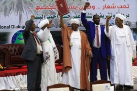 Sudan's President Omar al-Bashir receives the signed agreement of the National Dialogue at the Friendship Hall in Khartoum, Sudan, October 10, 2016. REUTERS/Mohamed Nureldin Abdallah