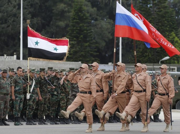 Russian soldiers march during a rehearsal of Victory Day parade, in which they will take part with a Syrian unit at Hmeimym airbase in Latakia province, Syria, 04 May 2016. Victory Day will be held on 09 May 2016 to mark the 71st anniversary since the capitulation of Nazi Germany to the Soviet Union. Hmeimym airbase serves as the base of operation for the Russian air force in Syria. The United States and Russia have agreed to extend the cease-fire in Syria to the city o