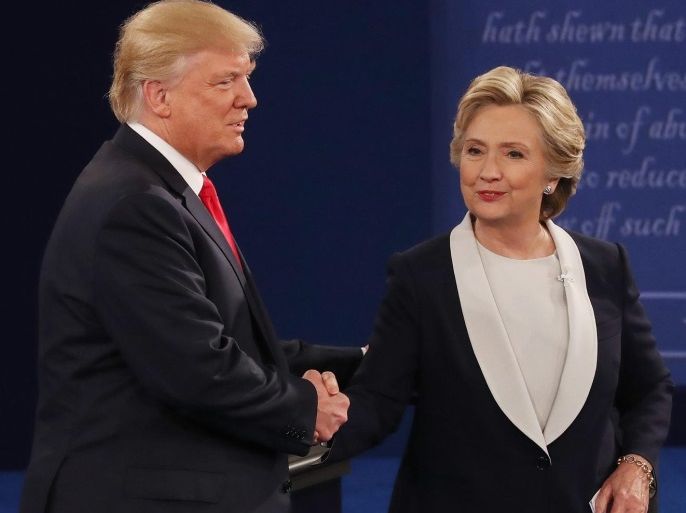 Republican Donald Trump (L) and Democrat Hillary Clinton (R) shake hands at the end of the second Presidential Debate at Washington University in St. Louis, Missouri, USA, 09 October 2016. The third and final debate will be held 19 October in Nevada.