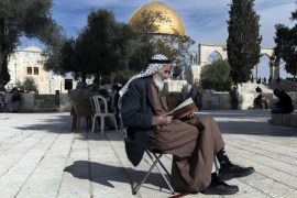 (FILE) The file picture dated 13 November 2014 shows the Dome of the Rock behind a Palestinian reading the Koran on a plaza in the al-Aqsa Mosque compound, or Temple Mount in Jerusalem, Israel. Following a Palestinian initiative, an UNESCO formal decision on 13 October 2016 denies a Jewish link to the Temple Mount and the Western Wall. Twenty-four countries supported the resolution, six voted against it and 26 members abstained.