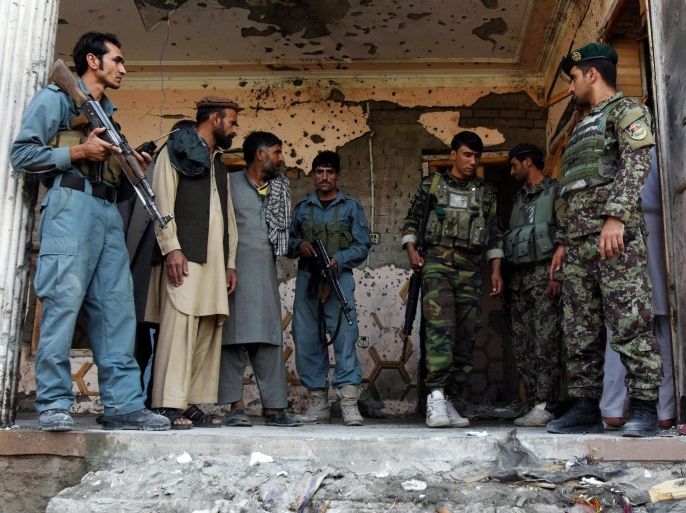 Afghan security officials inspect the scene of a suicide bomb attack in Jalalabad, Afghanistan, 31 October 2016. At least six civilians were killed and four wounded when a suicide bomber detonated explosives strapped to his body at a house of a tribal elder in Jalalabad.