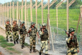 A picture made available on 14 August 2016 shows soldiers of the Indian Border Security Force (BSF) patrolling near the fence at the India-Pakistan International Border at Dayoli post of Akhnoor sector, about 45 km from Jammu, the winter capital of Kashmir, India, 13 August 2016. Security has been beefed up ahead of the upcoming India's Independence Day on 15 August as authorities raised alert all over the country.