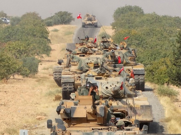 Turkish army tanks make their way towards the Syrian border town of Jarablus, Syria August 24, 2016. Picture taken August 24, 2016. Revolutionary Forces of Syria Media Office/Handout via REUTERS ATTENTION EDITORS - THIS IMAGE WAS PROVIDED BY A THIRD PARTY. EDITORIAL USE ONLY. NO RESALES. NO ARCHIVE. THIS PICTURE WAS PROCESSED BY REUTERS TO ENHANCE QUALITY. AN UNPROCESSED VERSION HAS BEEN PROVIDED SEPARATELY. TPX IMAGES OF THE DAY