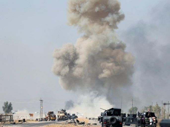 IED planted by Islamic States fighters explodes in front of Iraqi special forces vehicles in Bartella, east of Mosul, Iraq October 20, 2016. REUTERS/Goran Tomasevic