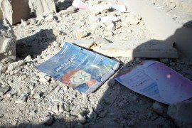 An Arabic language book lay on the ground at a school that was bombed a day earlier in rebel-held Idlib, northern Syria, 27 October 2016. At least 35 people were killed in a bombing on a school in Idlib a day earlier. Most of the victims are school childrren and rescue workers.