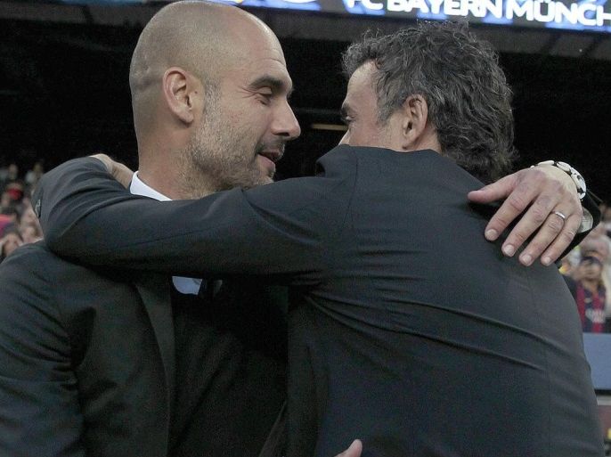 FC Barcelona's head coach Luis Enrique (R) embraces his counterpart Pep Guardiola (L) of Bayer Munich before the UEFA Champions League first leg semifinal match between FC Barcelona and Bayer Munich at Nou Camp stadium in Barcelona, Spain, 06 May 2015.