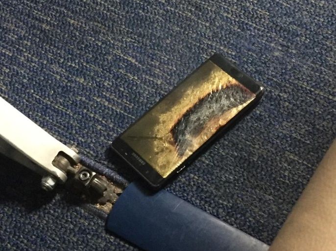 The burned Samsung Note 7 smartphone belonging to Brian Green is pictured in this undated handout photo obtained by Reuters October 6, 2016. The replacement model of the fire-prone smartphone began smoking inside a Southwest Airlines plane on October 5, 2016. Brian Green/Handout via REUTERS ATTENTION EDITORS - THIS IMAGE WAS PROVIDED BY A THIRD PARTY. EDITORIAL USE ONLY. NO RESALES. NO ARCHIVE.