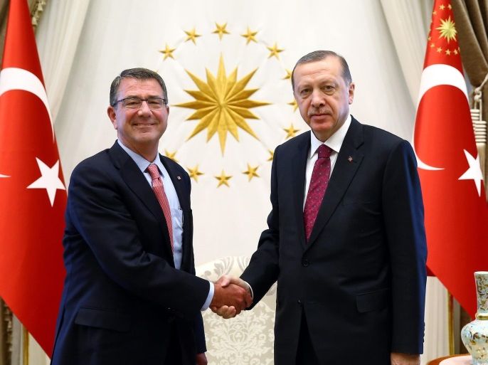 A handout picture provided by Turkish President Press office shows, US Secretary of Defense Ash Carter (L) shaking hands with Turkish President Recep Tayyip Erdogan (R) in Ankara , Turkey, 21 October 2016.