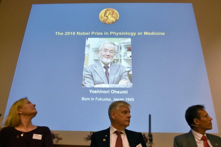 A photo of Yoshinori Ohsumi of Japan can be seen on the screen at the Nobel Forum after the announcement that he won the Nobel Prize in Medicine in Stockholm, Sweden October 3, 2016. TT News Agency/Stina Stjernkvist/ via REUTERS ATTENTION EDITORS - THIS IMAGE WAS PROVIDED BY A THIRD PARTY. FOR EDITORIAL USE ONLY. SWEDEN OUT. NO COMMERCIAL OR EDITORIAL SALES IN SWEDEN.