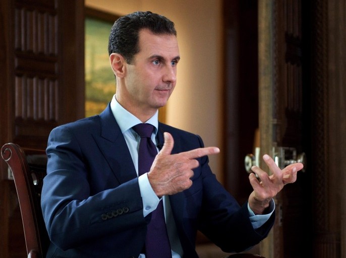 A handout picture made available on 06 October 2016 by Syria's offical Syrian Arab News Agency (SANA) shows Syrian President Bashar Al-Assad being interviewed by Danish journalist Rasmus Tantholdt (not pictured) for Denmarkâ€™s TV2 channel in Damascus, Syria, 05 October 2016. EPA/SANA / HANDOUT
