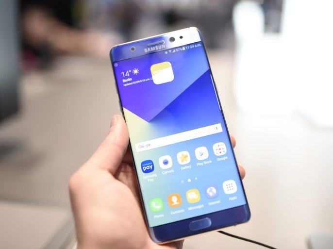 (FILE) A file picture dated 02 September 2016 shows a Samsung Galaxy Note 7 being held at the IFA trade fair in Berlin, Germany. According to media reports, a Samsung Note 7 device caught fire on a Southwest Airlines plane that was about to take off from Louisville, Kentucky, USA on 05 October. The phablet was reportedly one of the new 'safe' replacement devices that Samsung released after its global recall on 02 September. The plane was evacuated before it could take