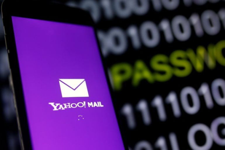 Yahoo Mail logo is displayed on a smartphone's screen in front of a code in this illustration taken in October 6, 2016. REUTERS/Dado Ruvic