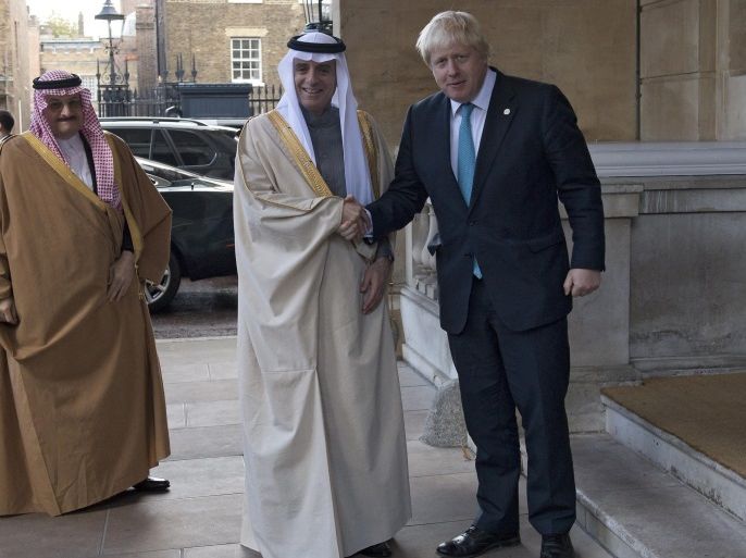 British Foreign Secretary Boris Johnson (R) welcomes Saudi Foreign Minister Adel al-Jubeir (C) ahead of a meeting to discuss the situation in Syria, at Lancaster House in London, Britain, 16 October 2016. The meeting follows up on the previous day's round of talks on Syria in Vienna. EPA/JUSTIN TALLIS