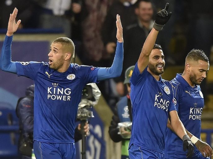 Leicester City's Riyad Mahrez (C) and Islam Slimani (L) celebrates after scoring the 1-0 lead during the UEFA Champions League Group G match between Leicester City and FC Copenhagen at the King Power Stadium in Leicester, Britain, 18 October 2016.