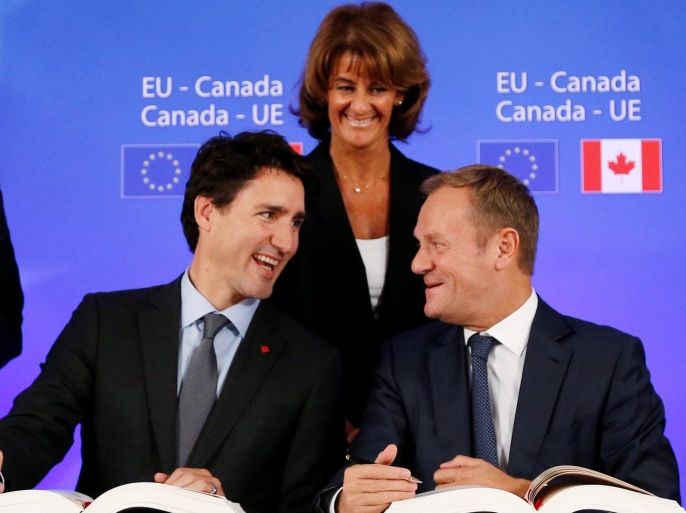 Canada's Prime Minister JustinTrudeau and European Council President Donald Tusk attend the signing ceremony of the Comprehensive Economic and Trade Agreement (CETA), at the European Council in Brussels, Belgium, October 30, 2016. REUTERS/Francois Lenoir TPX IMAGES OF THE DAY