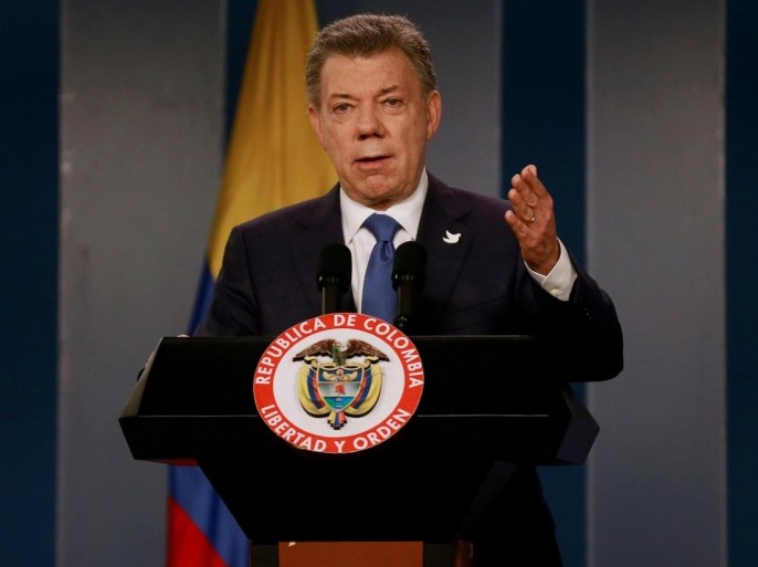 Colombia's President Juan Manuel Santos talks during a news conference after a meeting with Colombian former President and Senator Alvaro Uribe at Narino Palace in Bogota, Colombia, October 5, 2016. REUTERS/John Vizcaino/File Photo